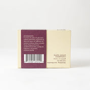 Bar of soap with a visible label on a white background