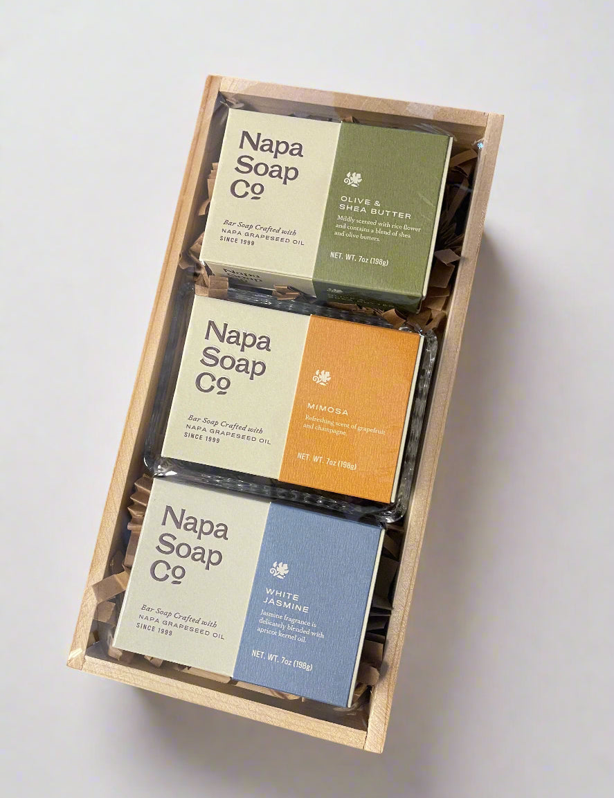 Set of Napa Soap Co. soaps in a wooden box on a white background